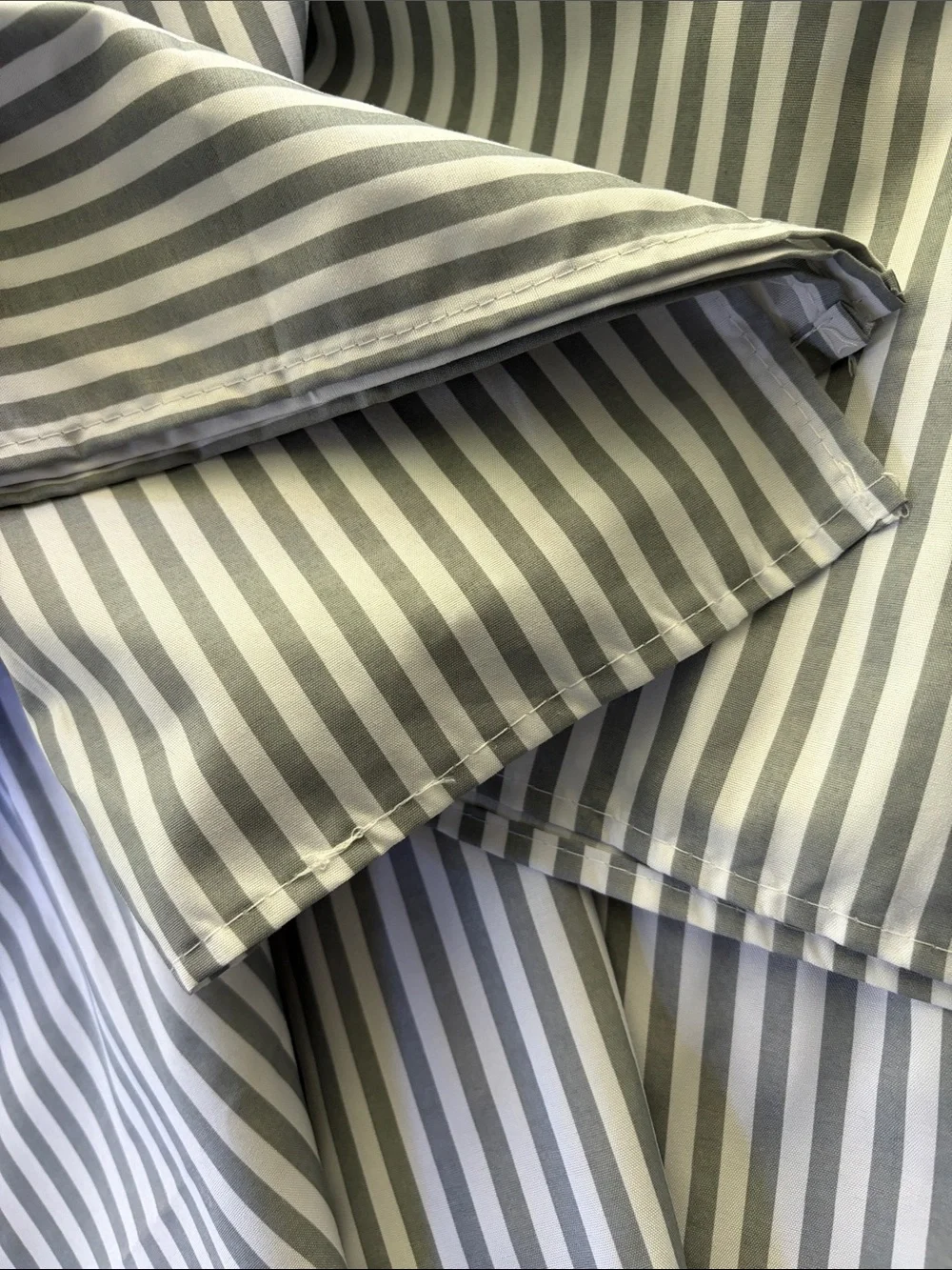 Grey and white striped tablecloth